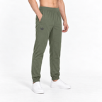 Le pantalon de pluie vert olive